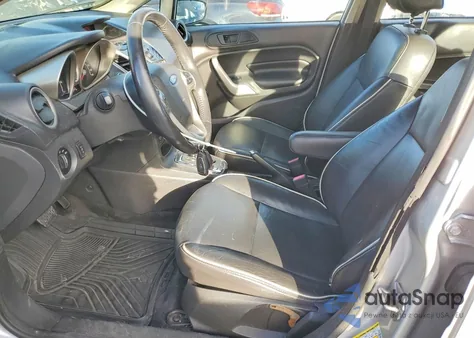 2013 Ford Fiesta Titanium z USA, uszkodzony, nr VIN 3FADP4CJ5DM173353